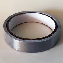 Load image into Gallery viewer, A 5 meter roll of conductive tape, The core of the roll is 7cm and the tape is 2cm wide. The roll is closed
