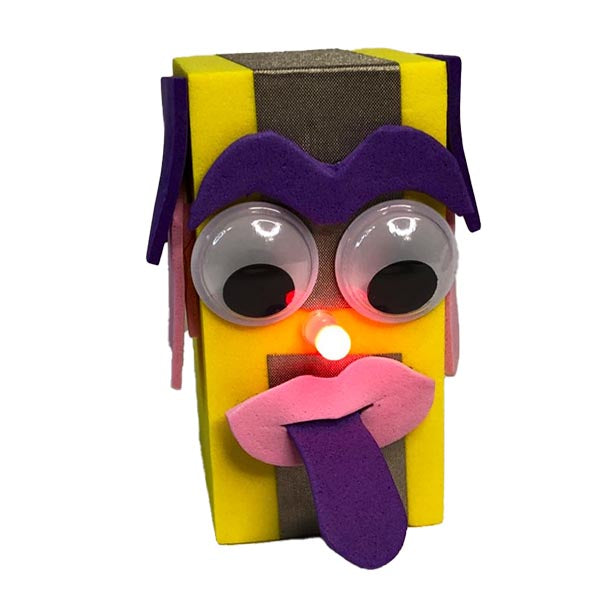 A TapeBlock face with purple eyebrows, white and black eyes, pink lips and a purple tongue