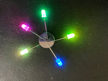 Load image into Gallery viewer, 5 LEDs around a 3V button cell battery, pink, green, yellow, blue, white
