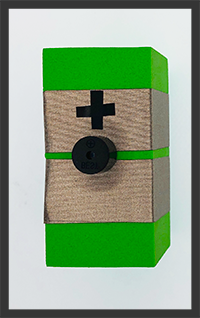 Foam block with two rows of conductive tape. buzzer in the middle of the block