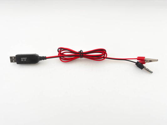 USB cable with alligator clips on a white background