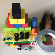 Load image into Gallery viewer, Contents of the TapeBlock making kit in a pile including Foam Blocks and sheet foam, LEDs, switches, motors and conductive tape, fur and eyes are included. This is more spaced out
