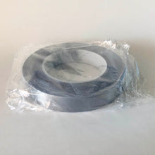 Load image into Gallery viewer, A roll of conductive tape in a bag. The core of the roll is 7cm and the tape is 2cm wide. 
